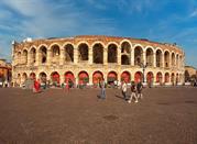 View to Verona Arena (Arena di Verona), popular tourist attraction, people walking by